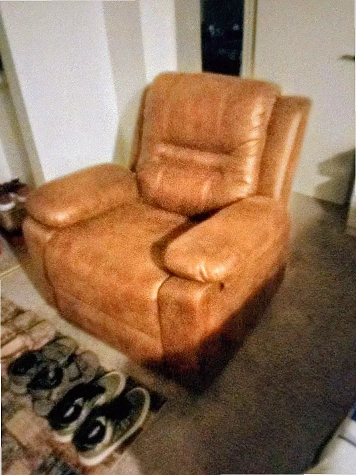 Brown Faux Leather Recliner( 3 months Old) ( Never Been Used)$125